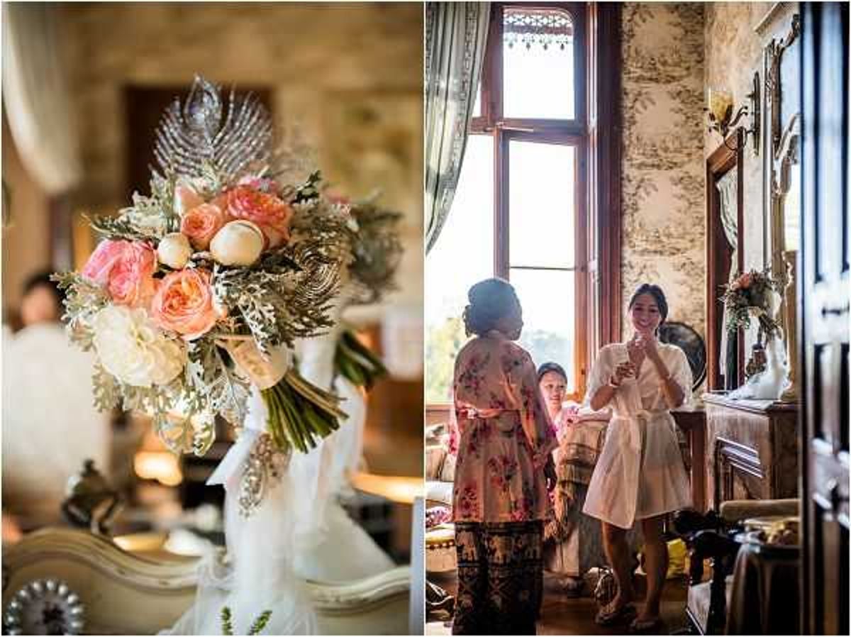 A diptych image showing two getting-ready scenes. On the left, a close-up detail shot of a bridal bouquet featuring coral and blush garden roses, ivory peonies or ranunculus, and silver-toned dusty miller foliage, accented with decorative silver feather and jeweled brooches, wrapped in white ribbon. On the right, a wide interior shot of two women in a ornately decorated room with toile wallpaper, tall windows with draped curtains, and antique furnishings — one woman wears a floral kimono-style robe and the other wears a white short robe, suggesting a bridal preparation scene; a third person is partially visible in the background. The room has the appearance of a French chateau or manor house interior. The overall styling theme is classic with vintage and art deco accents.