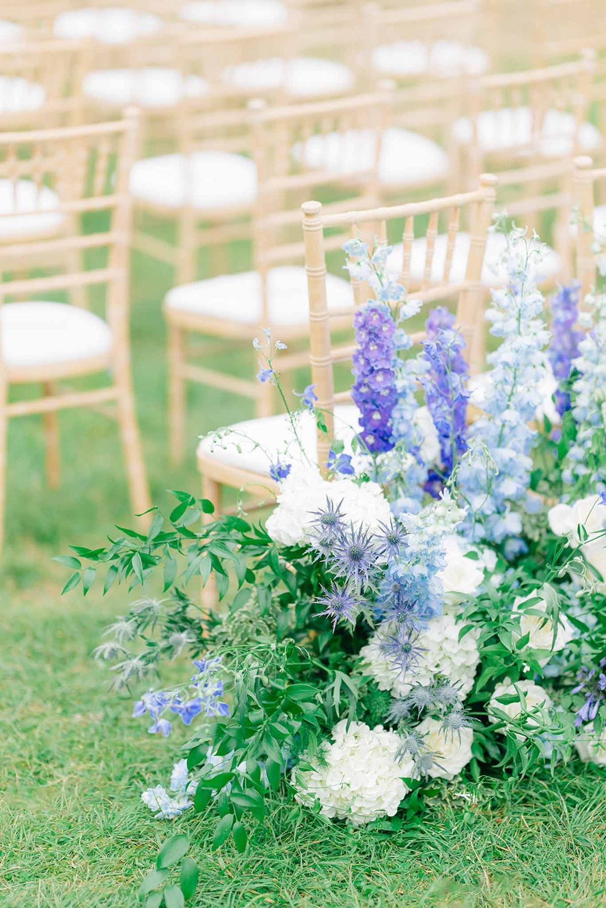 Wedding ceremony setup with floral decorations at a French chateau