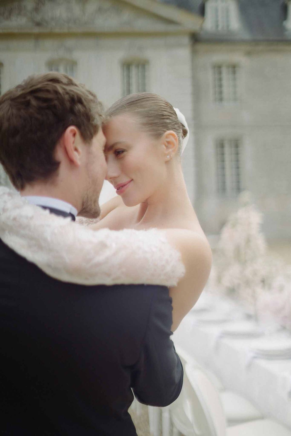 Bride and groom intimate portrait at stone manor house wedding venue