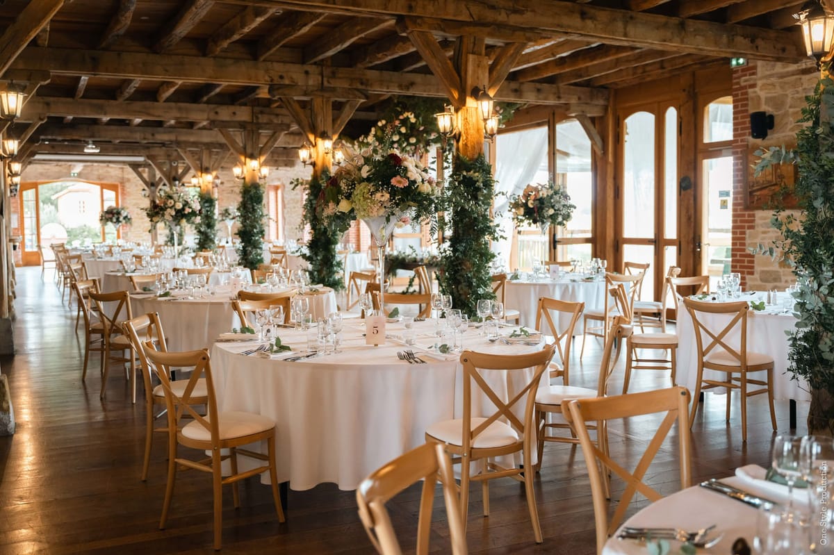 Wedding reception table setting with white roses