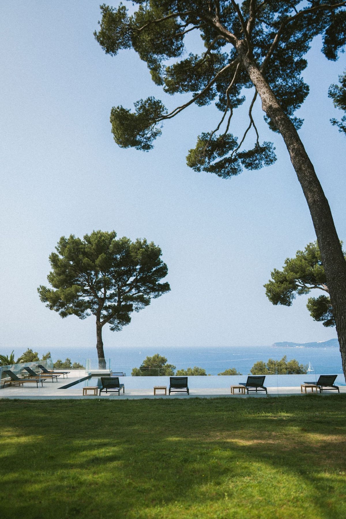 Infinity pool with sea view and pine trees at Domaine Rocabella, French Riviera