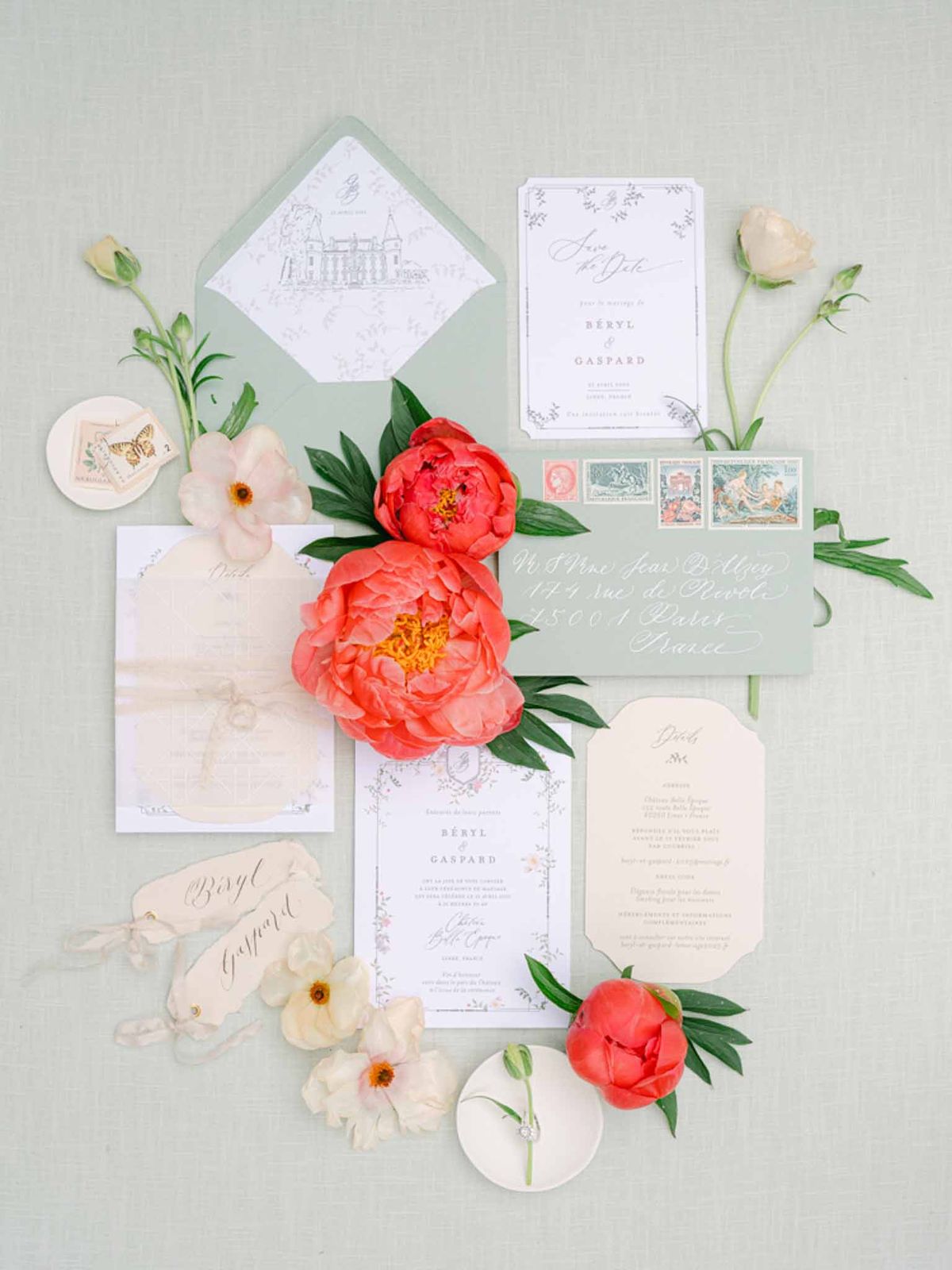 French wedding stationery suite in sage green and cream with chateau illustration, peonies, and diamond ring