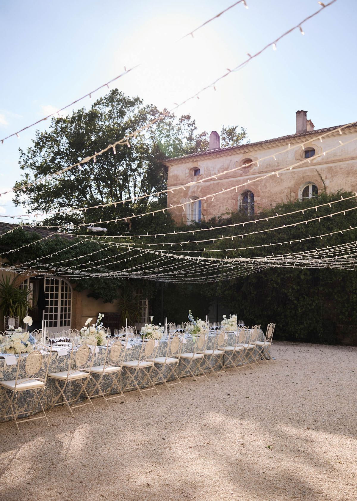 Wedding reception table setting with white roses