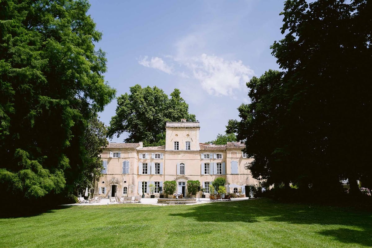 Full facade of Chateau des Barrenques from lawn Provence