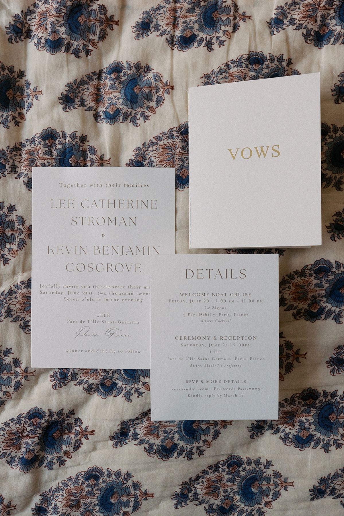 Wedding stationery suite with vows booklet on a blue and ivory block-print bedspread