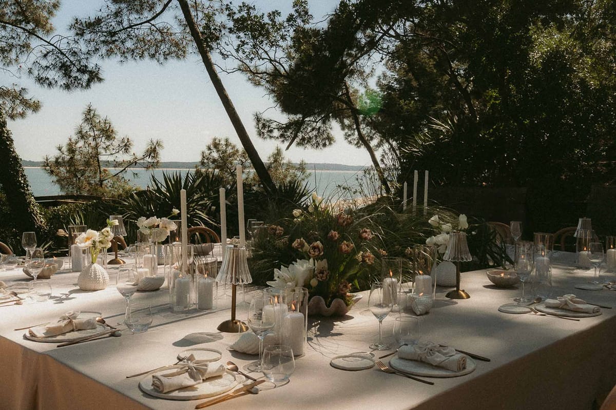 Wedding reception table setting with peonies