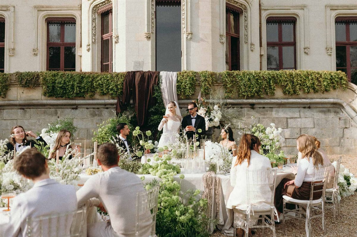 Wedding reception table setting with peonies