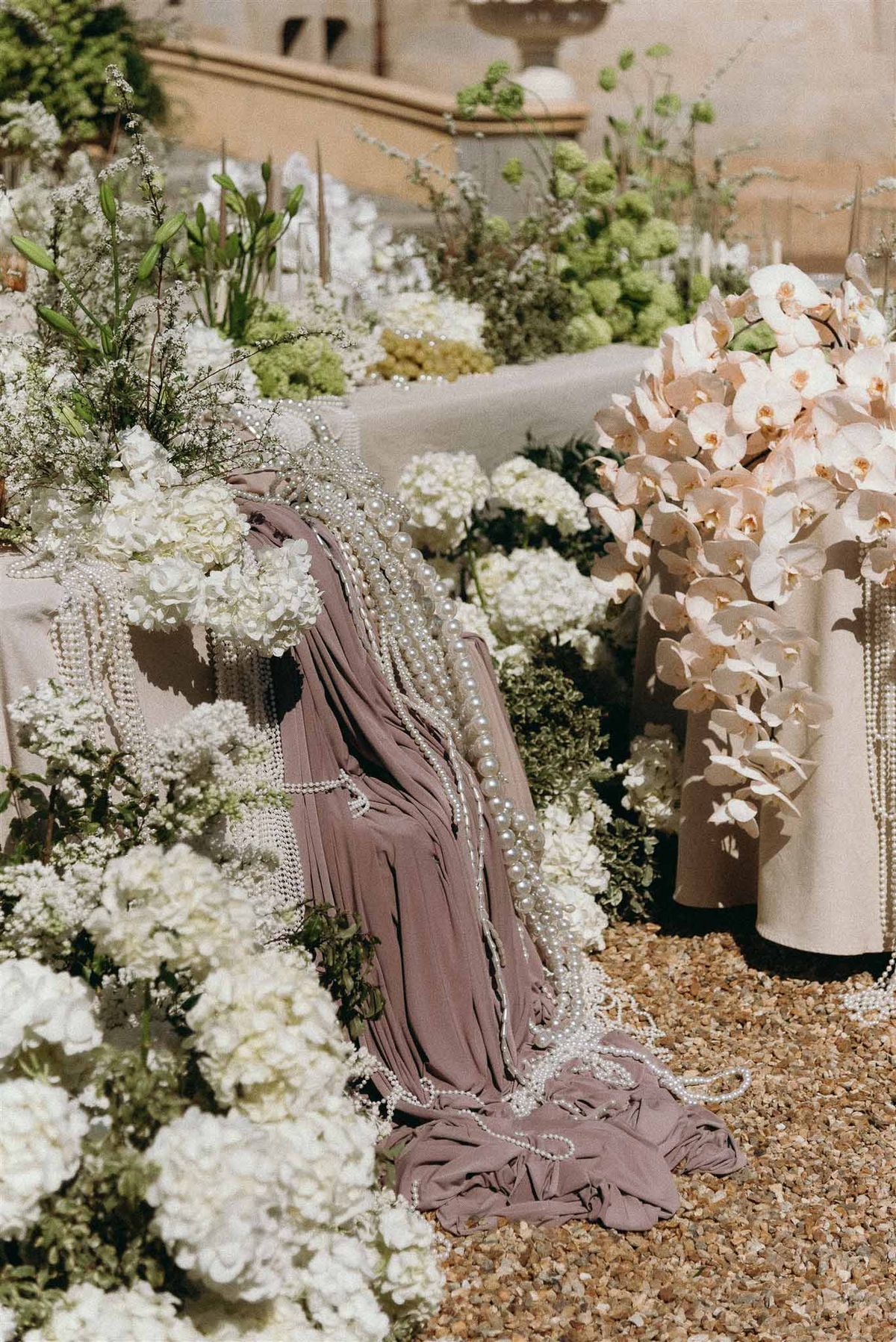 Wedding ceremony in a garden with hydrangeas