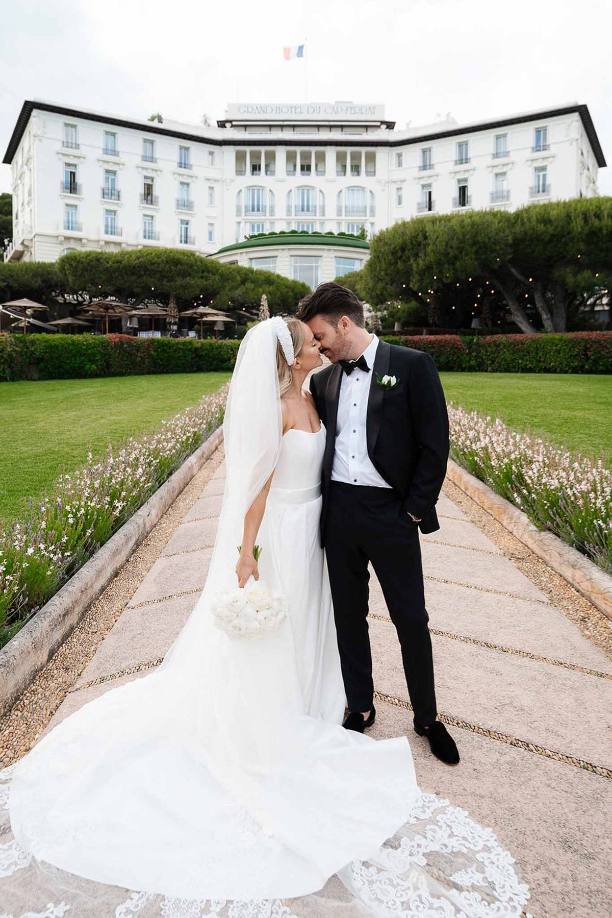Bride and groom portrait in a garden