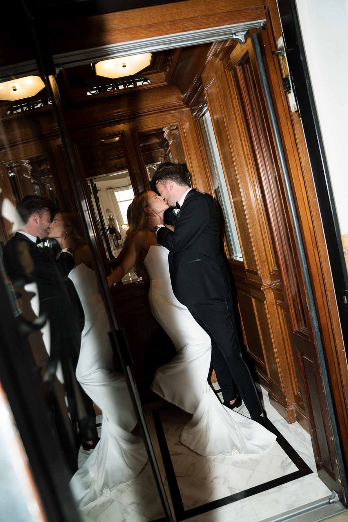 Bride and groom kissing