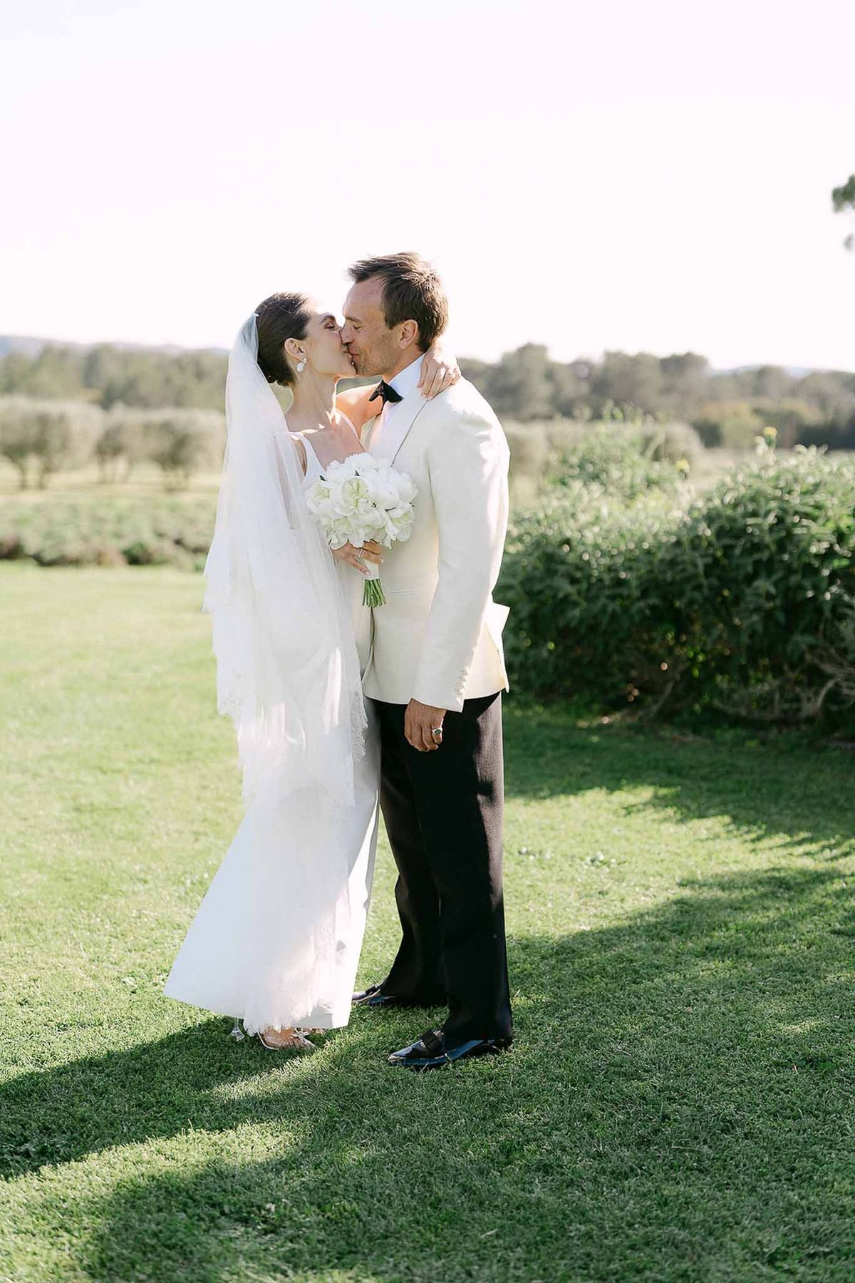 Bride and groom kissing