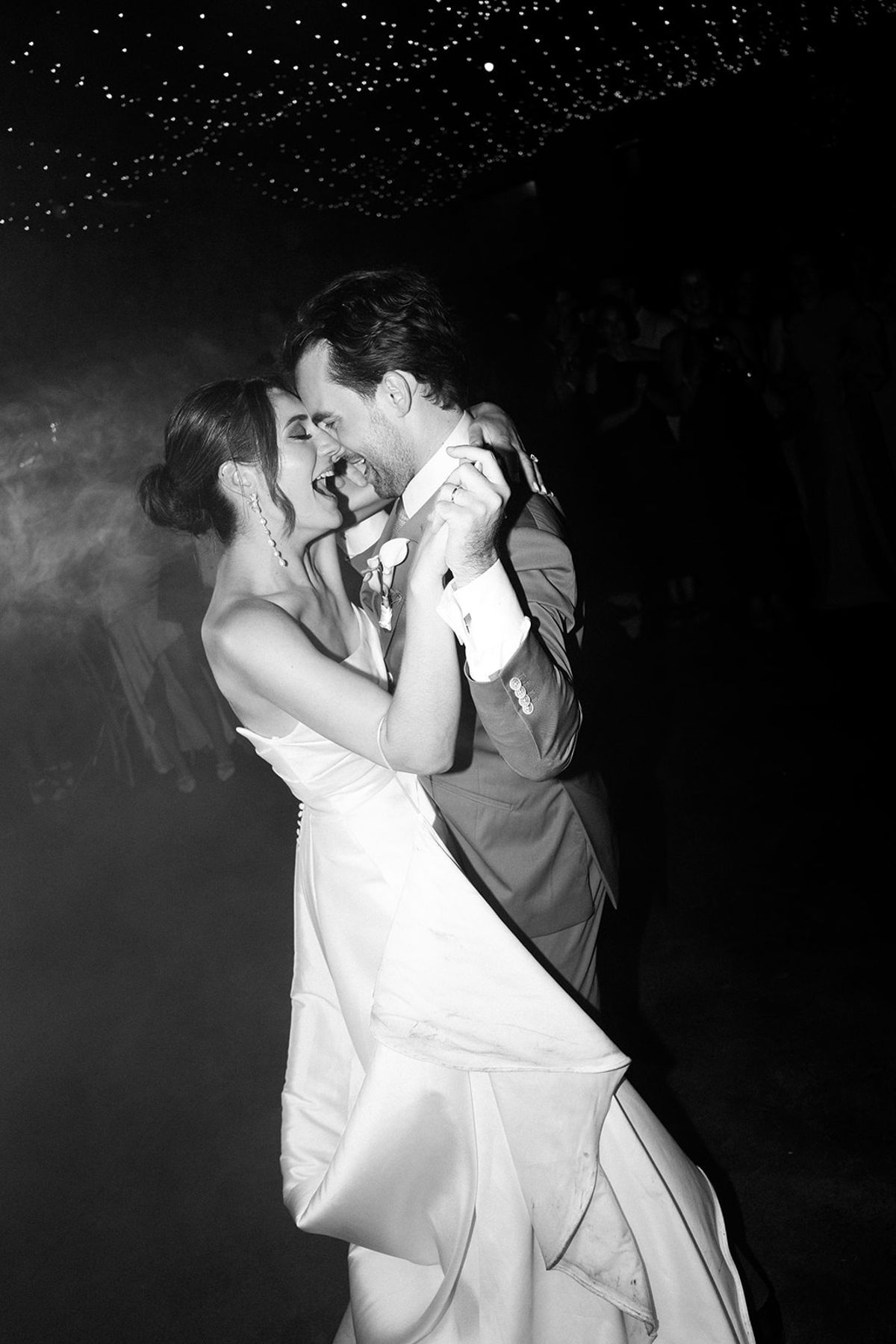 Couple embracing while dancing at reception at Les Domaines de Patras, Provence