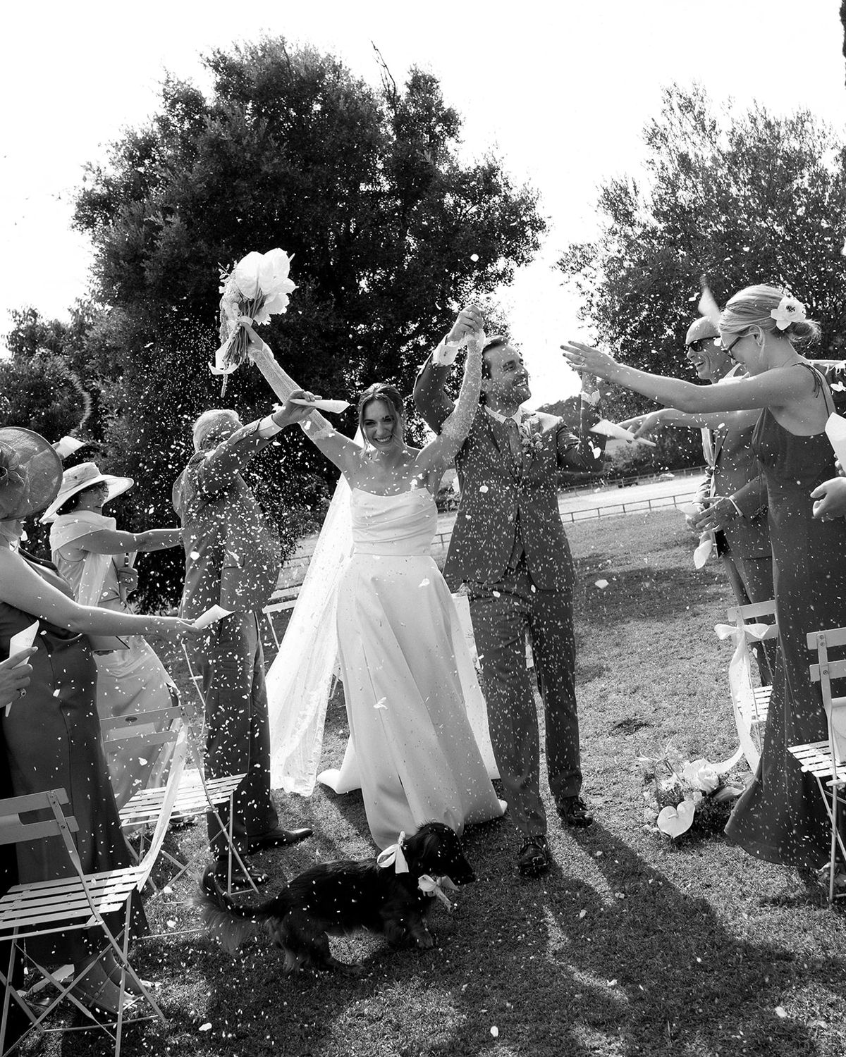 Couple recessional petal toss with guests at Les Domaines de Patras, Provence