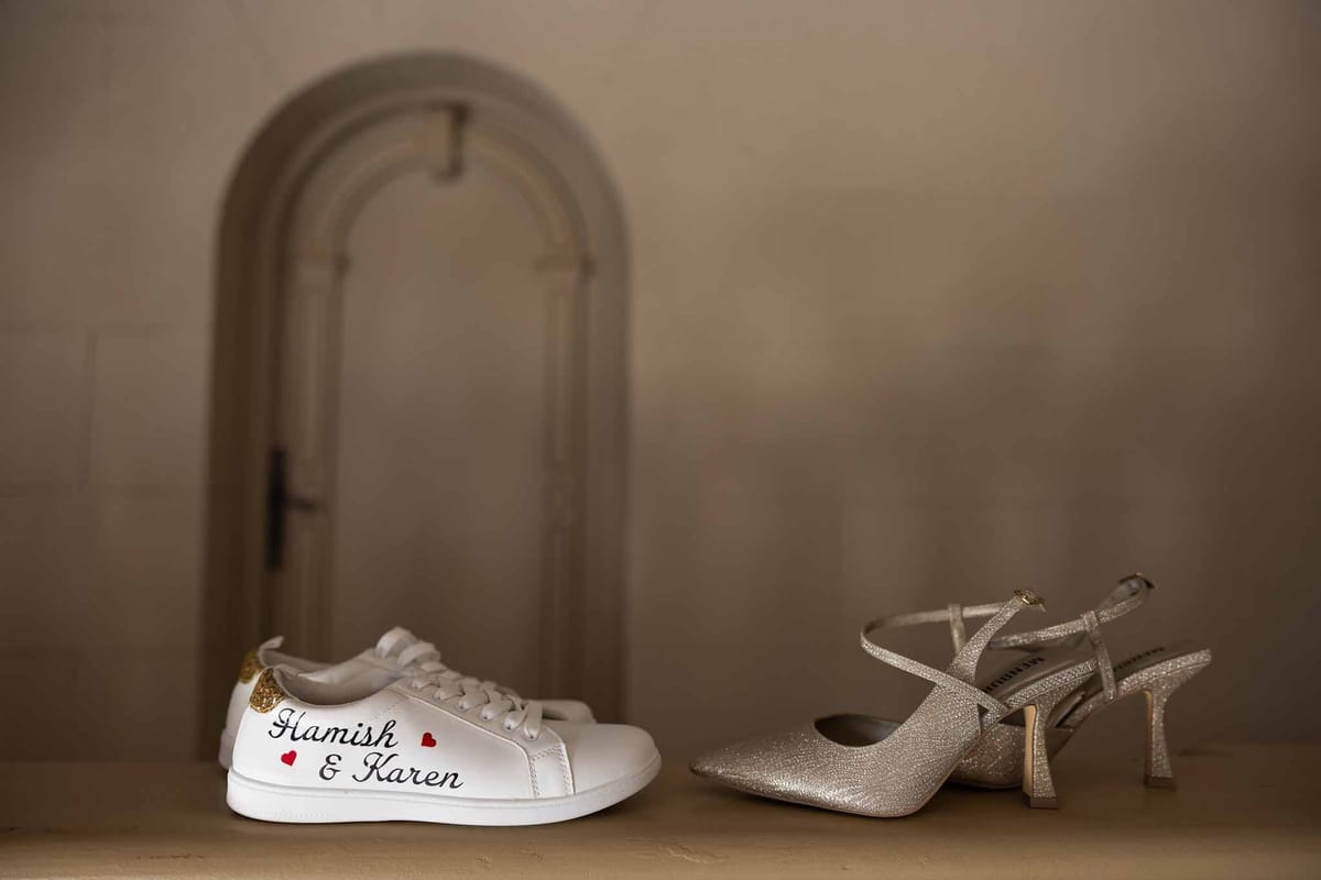 Personalised wedding sneakers and silver bridal heels at Parc Mougins