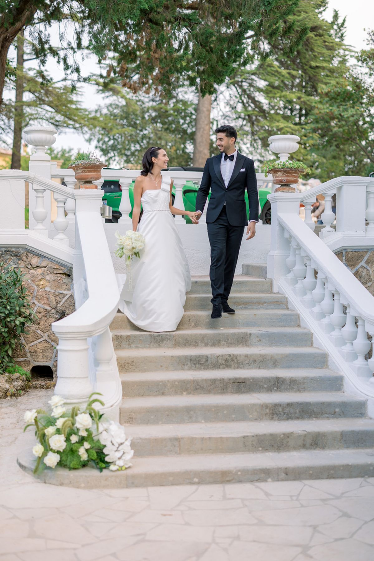 Bride and groom walking hand in hand