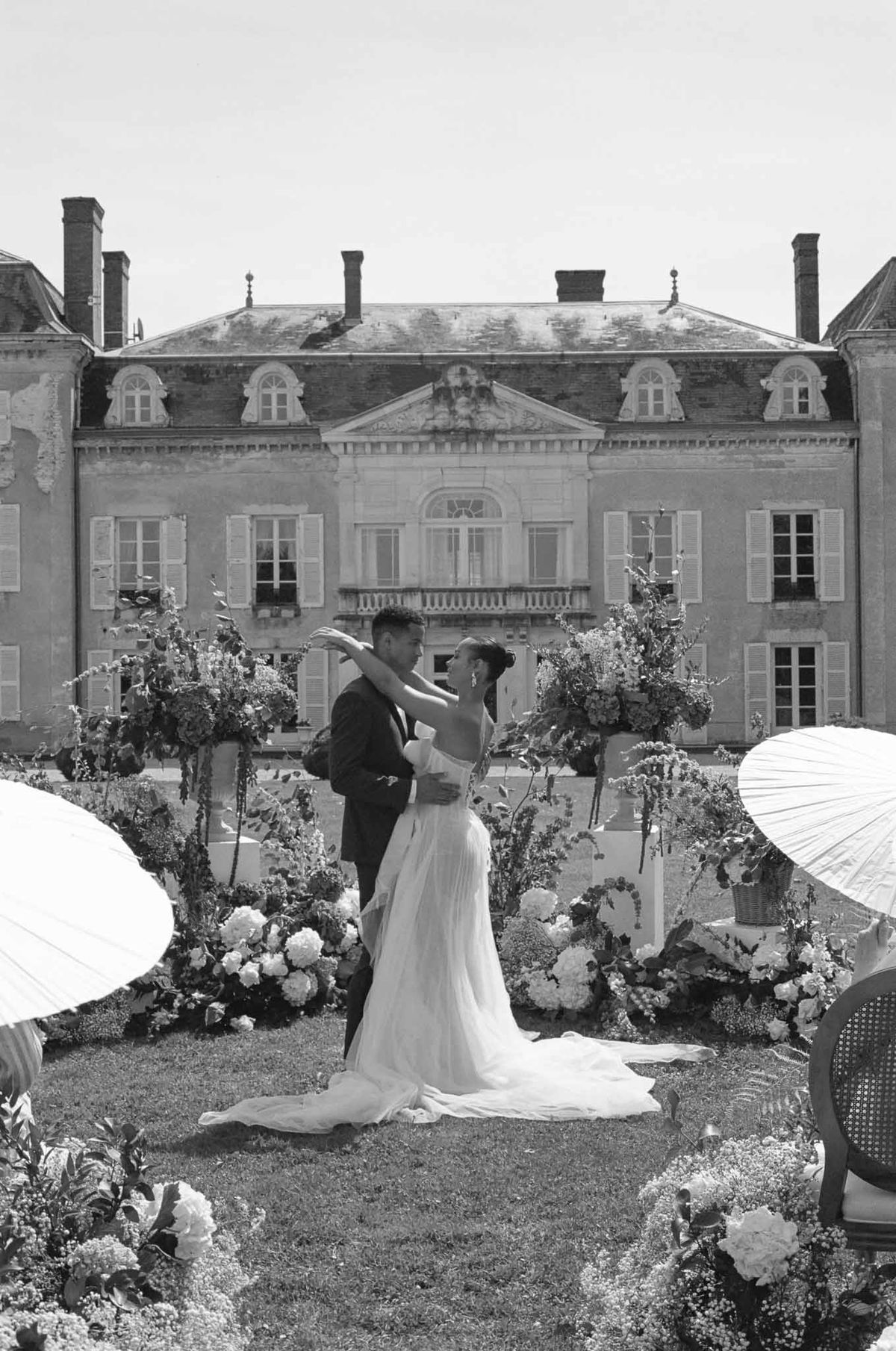 Black and white photo of wedding ceremony with hydrangeas
