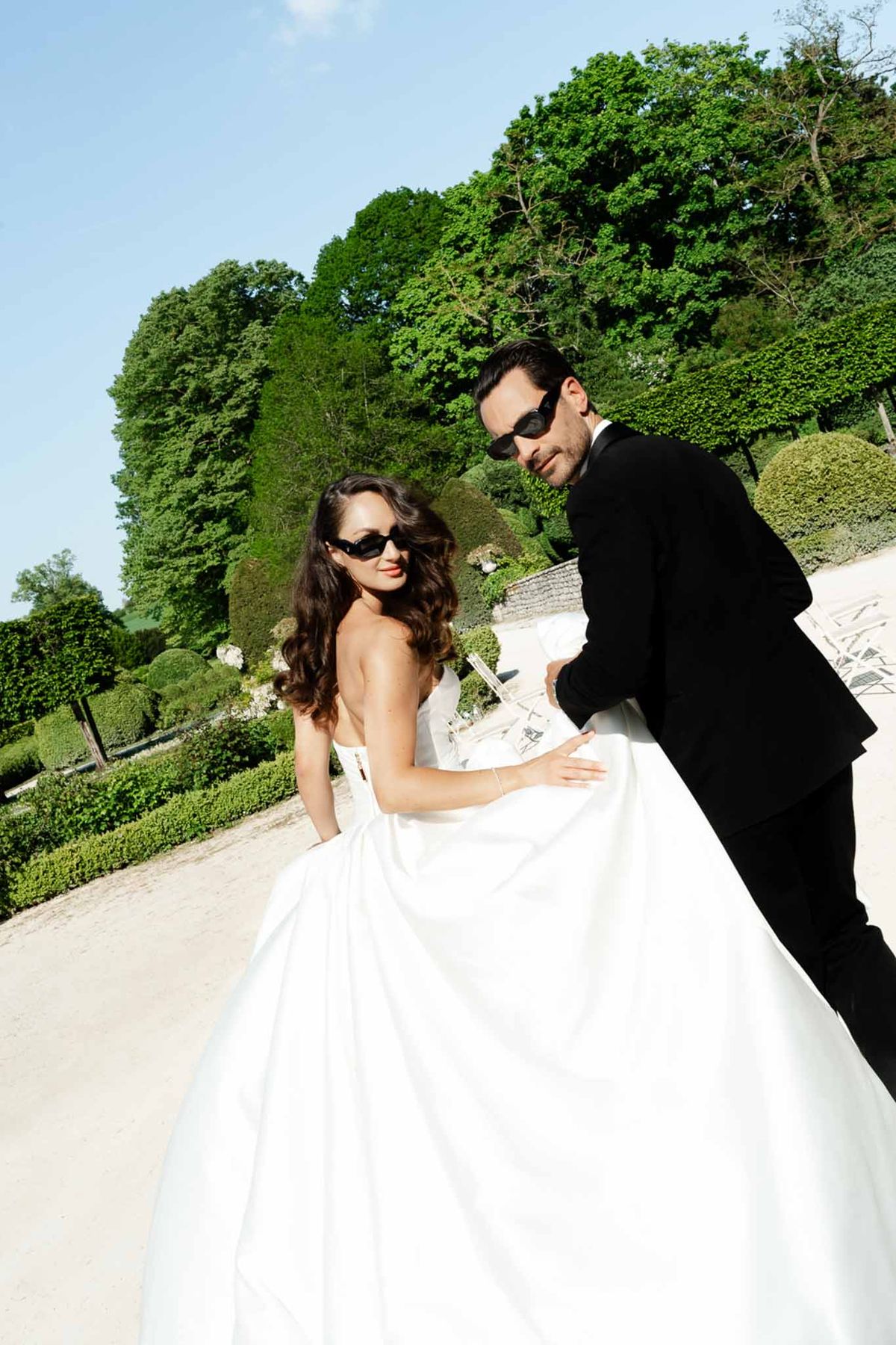 Bride and groom portrait in a garden