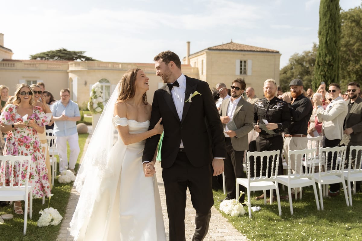 Recessional walk after the ceremony at Chateau Gassies, Nouvelle-Aquitaine