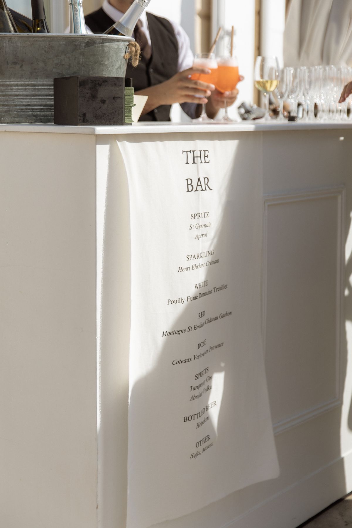 Linen bar menu and champagne at the cocktail bar at Chateau Gassies, Nouvelle-Aquitaine