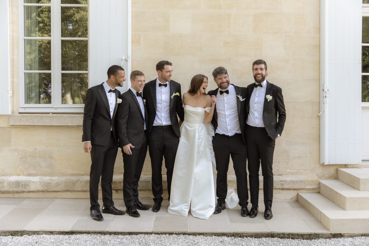 Bride and groomsmen portrait at Chateau Gassies, Nouvelle-Aquitaine