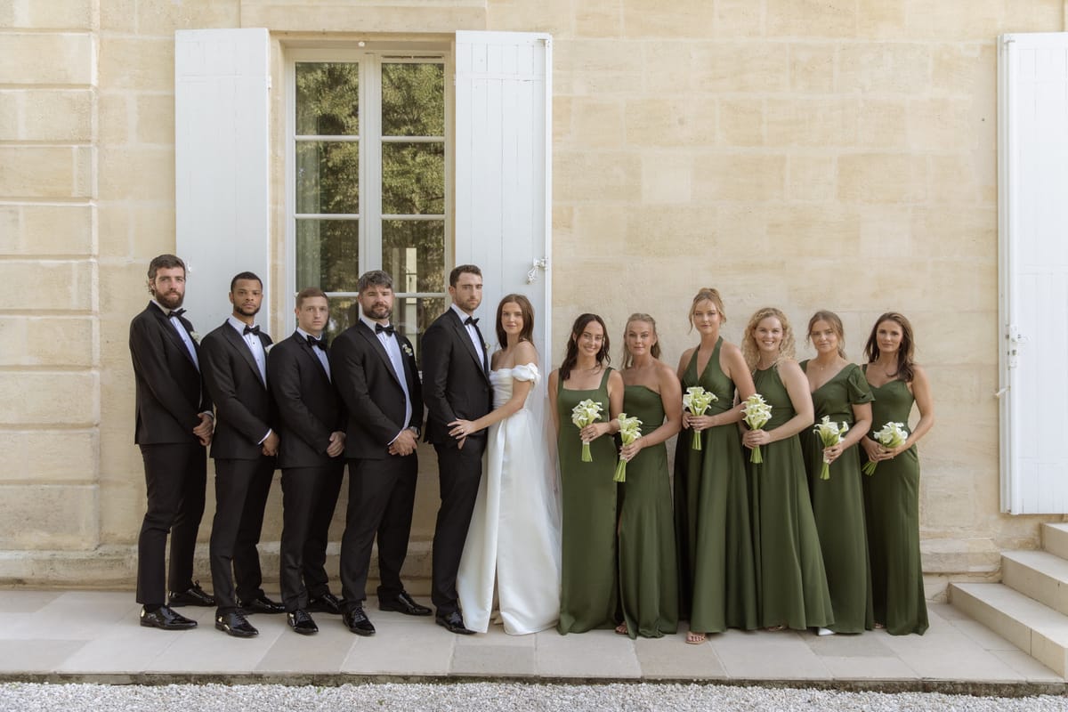 Full bridal party portrait at Chateau Gassies, Nouvelle-Aquitaine
