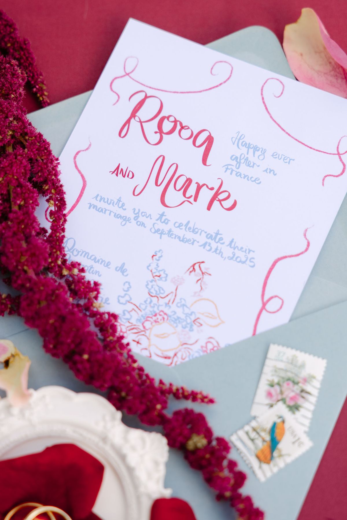 Hand-lettered stationery and styling details in fuchsia and sky blue from Rooa and Mark's wedding at Domaine de Perrotin