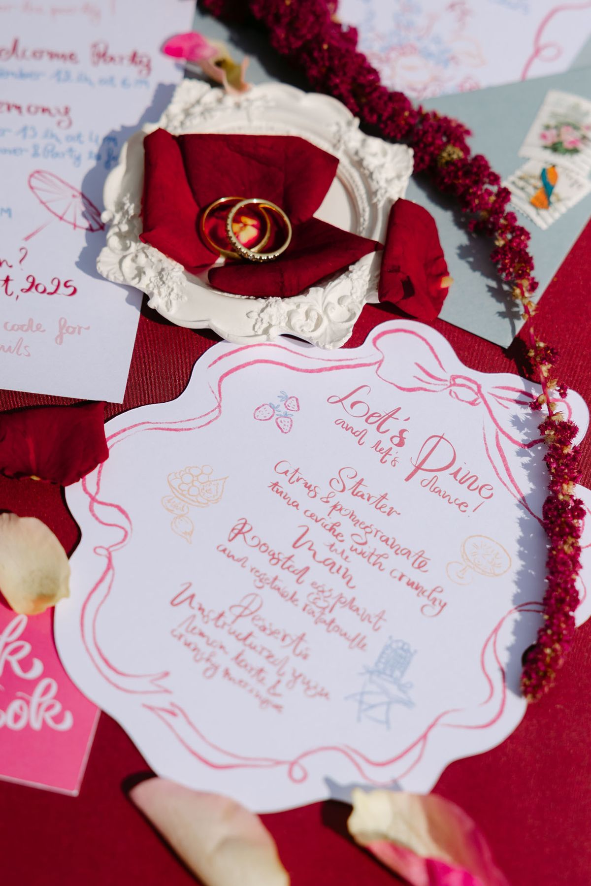 Hand-lettered stationery and styling details in fuchsia and sky blue from Rooa and Mark's wedding at Domaine de Perrotin