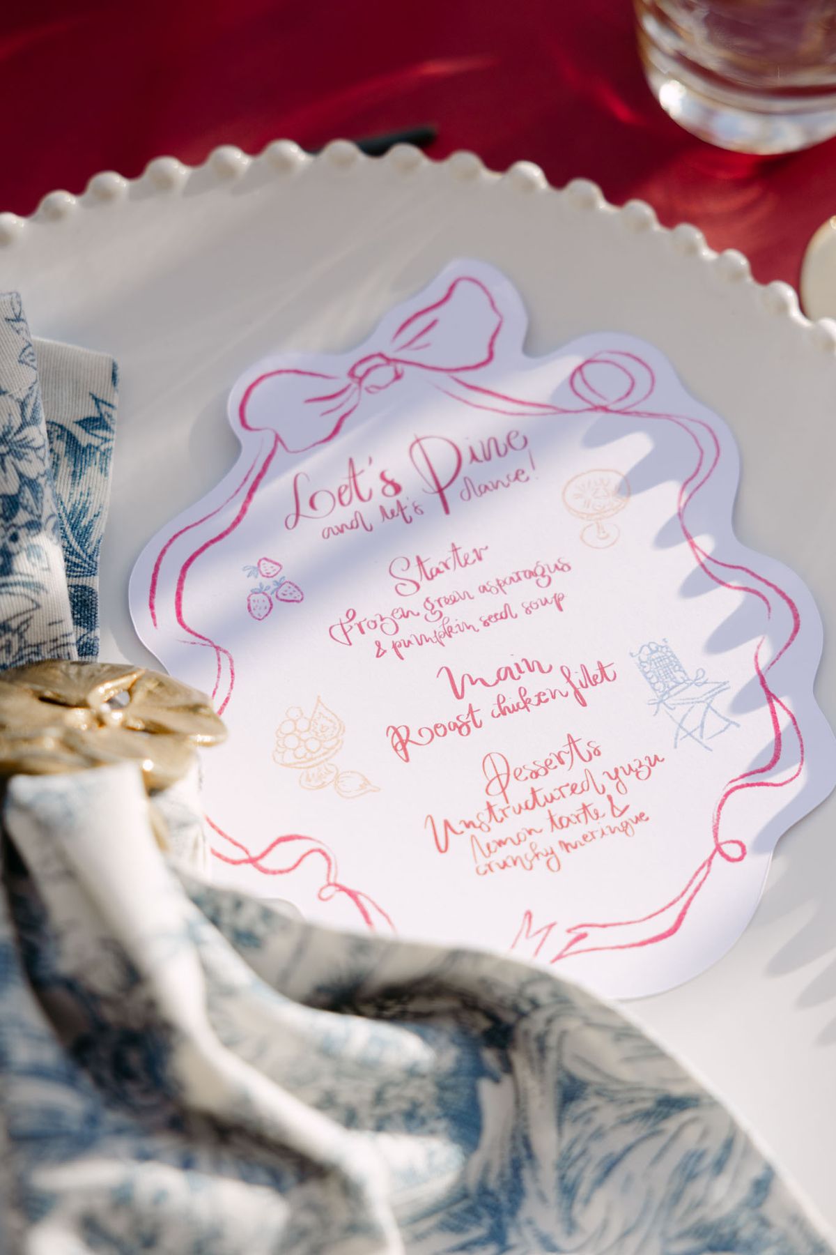 Hand-lettered stationery and styling details in fuchsia and sky blue from Rooa and Mark's wedding at Domaine de Perrotin