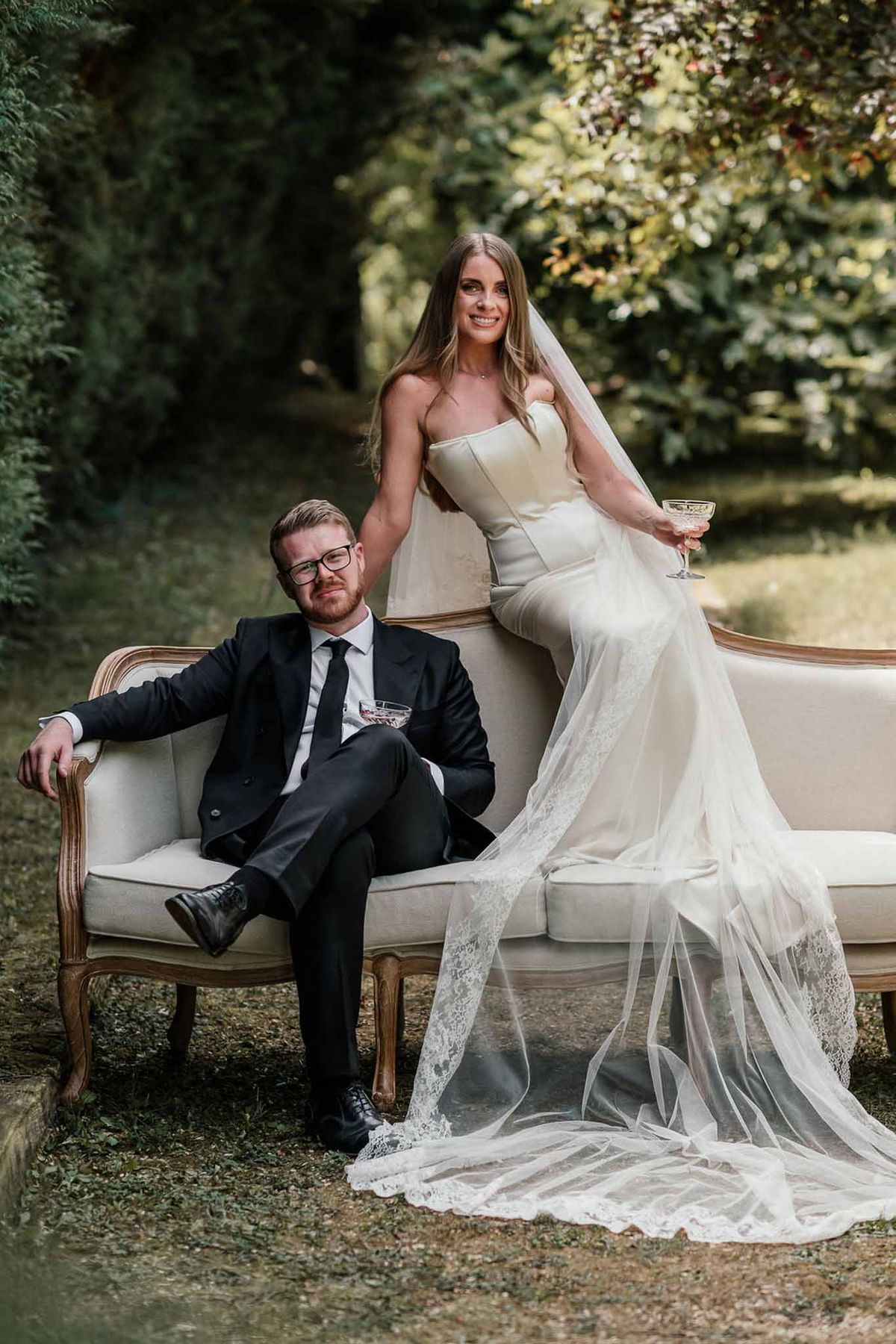 Bride and groom portrait in a garden