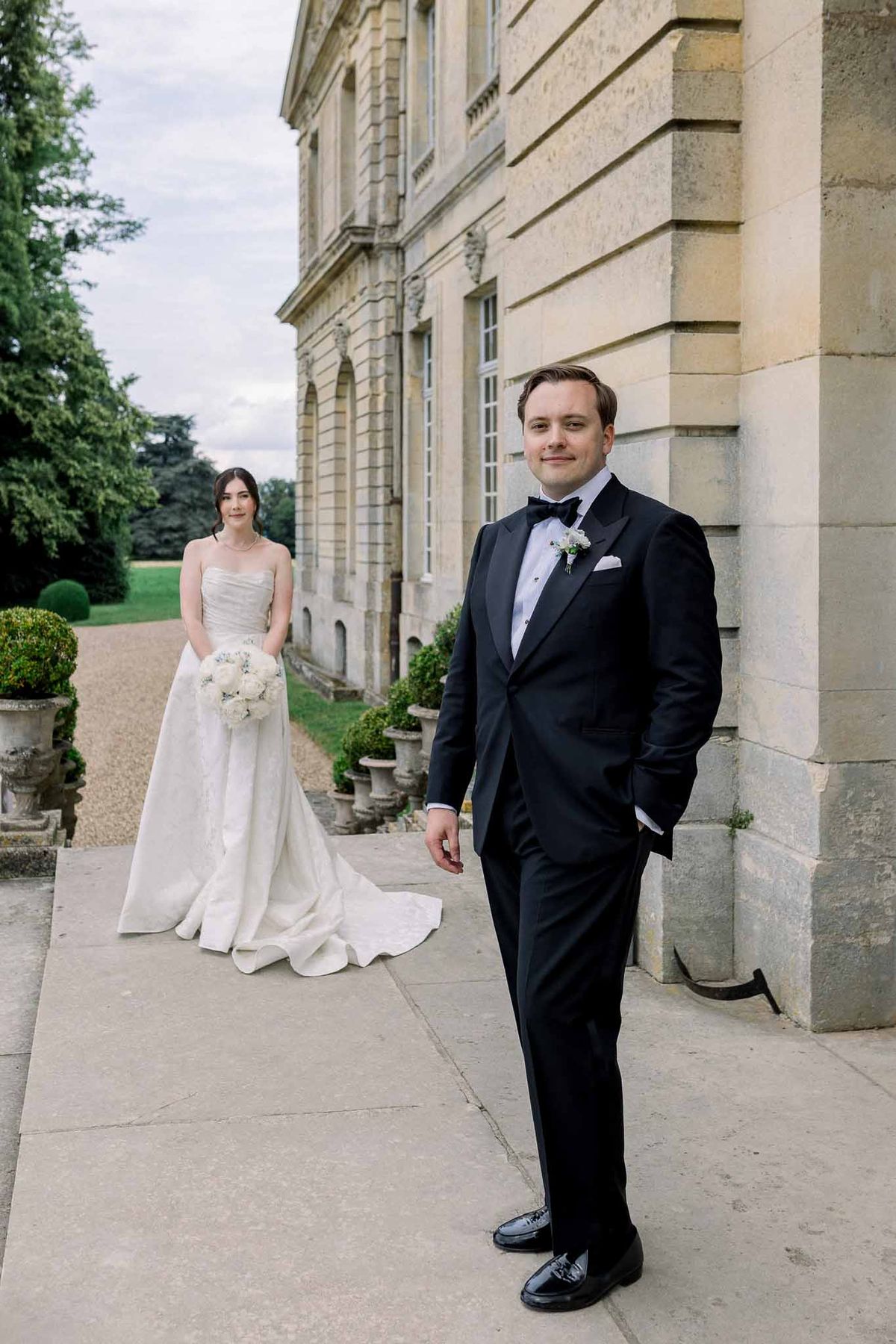 Bride and groom portrait in a garden