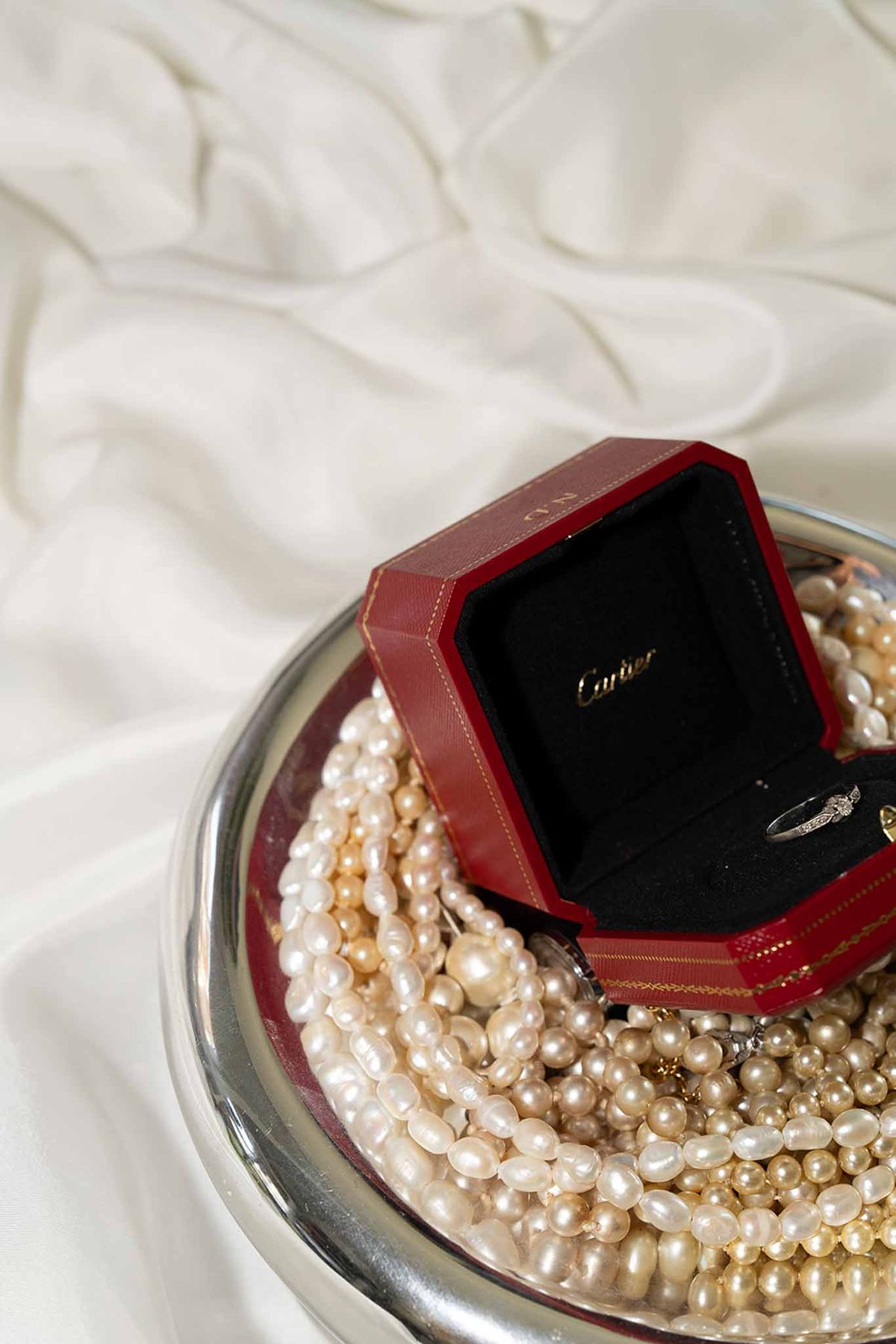 Pearl accessories and red ring box detail