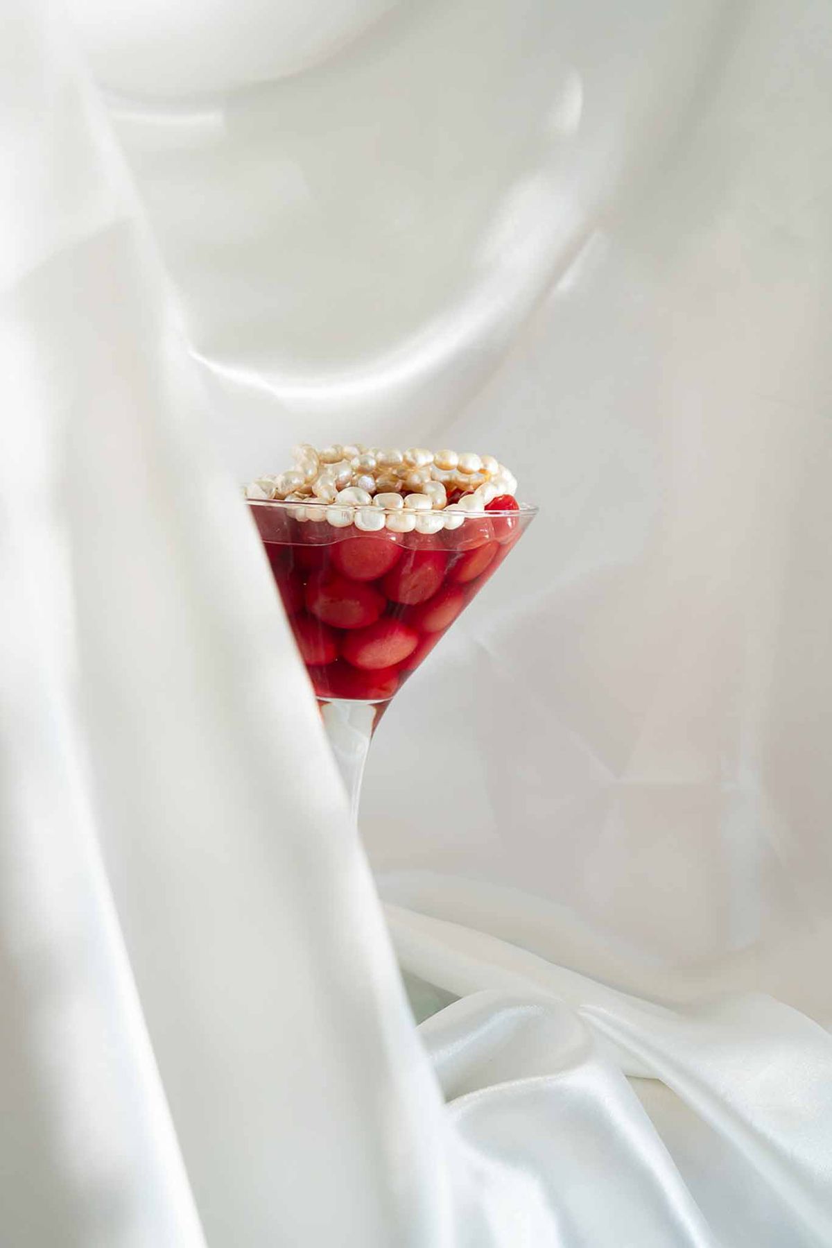 Martini glass cocktail with pearl decor detail