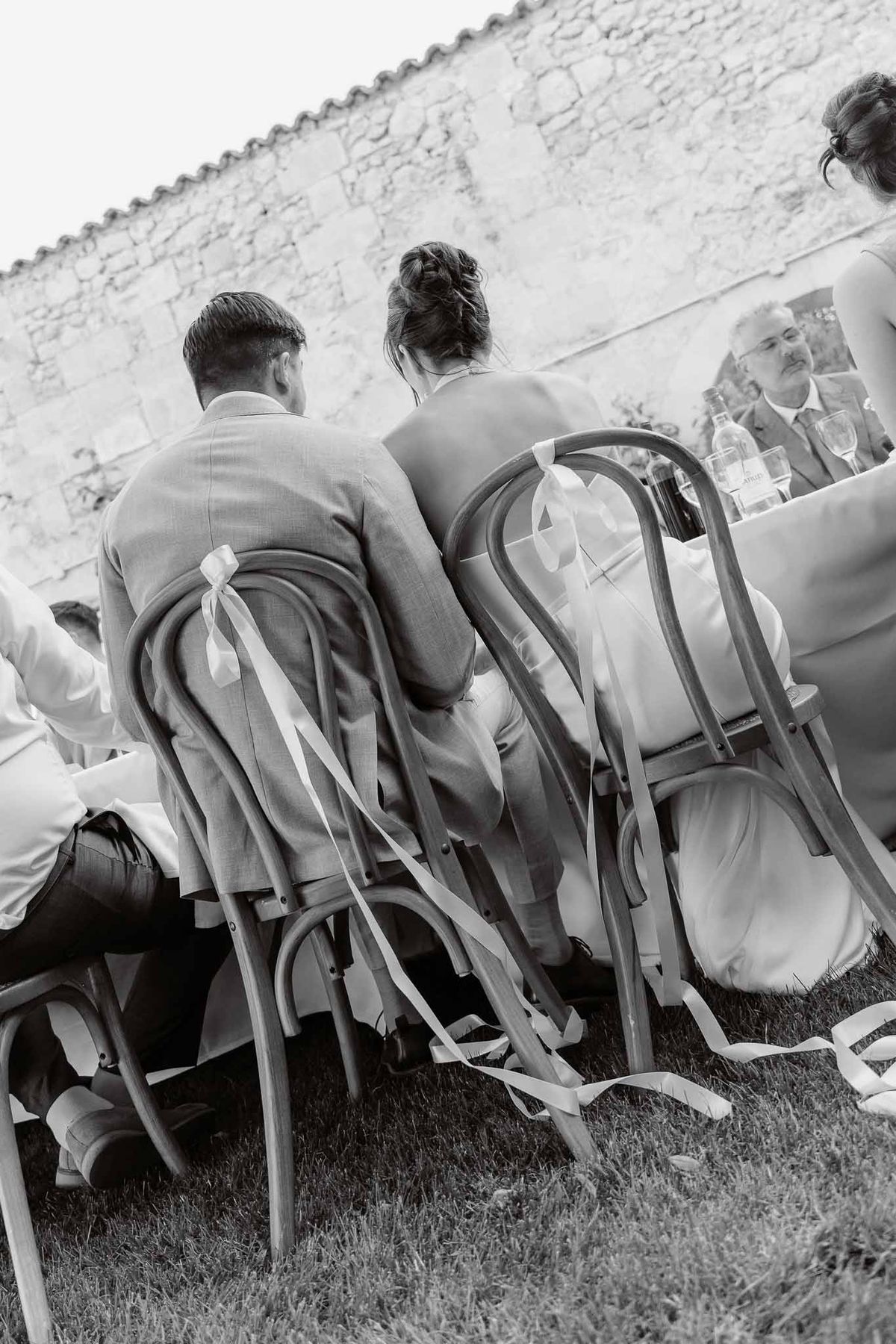 Black and white photo of wedding reception table setting