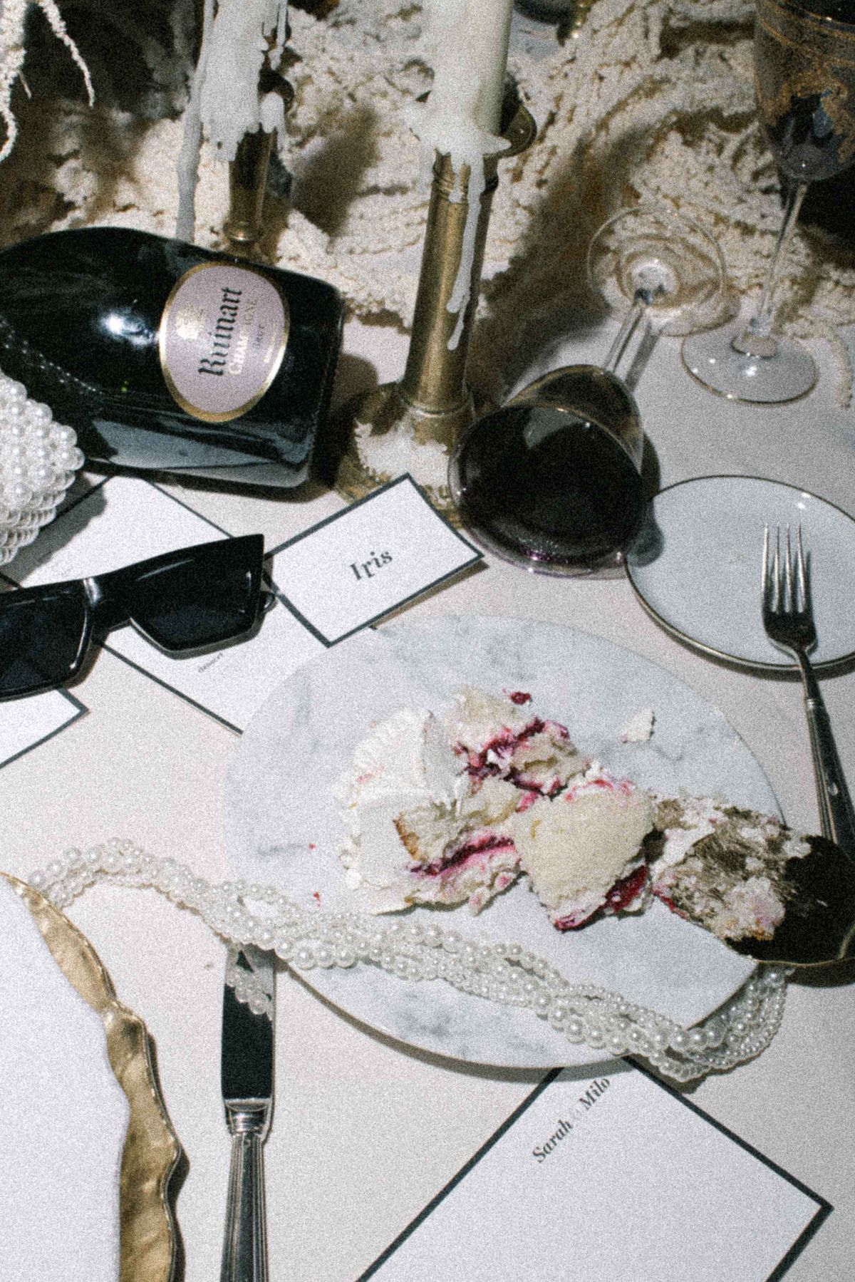 Place setting with a name card and dessert, seen from above