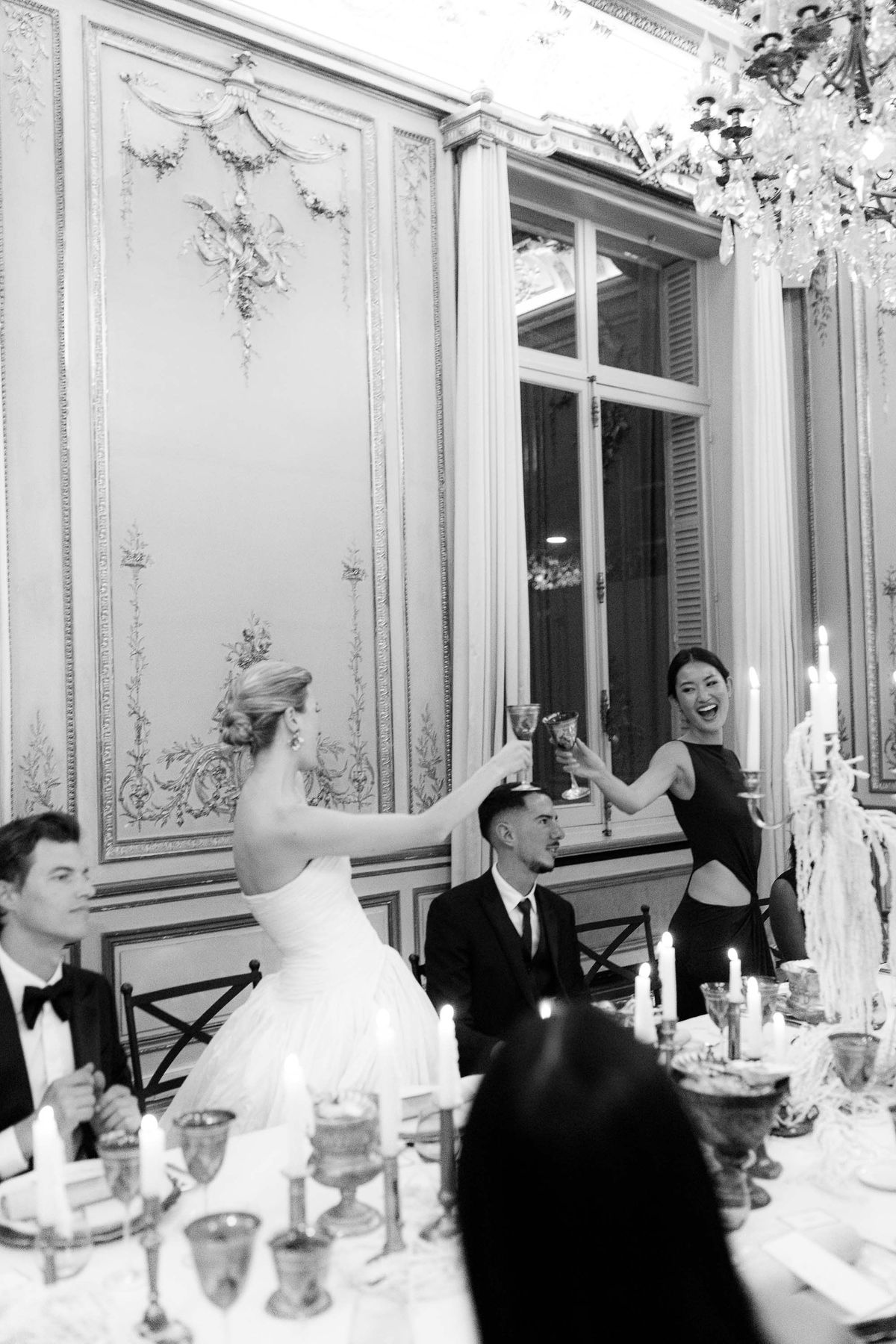 Couple and a guest during the black and white party scene