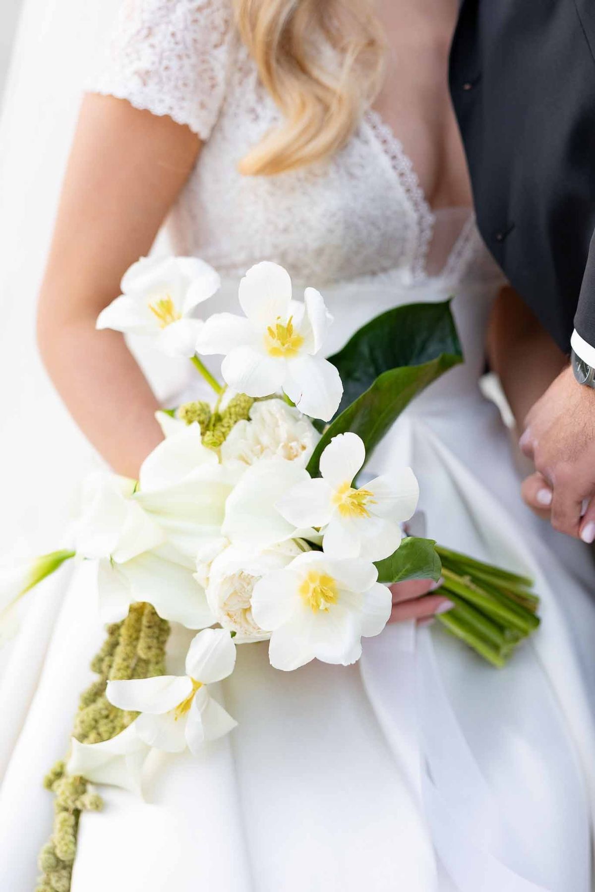 White calla lily and orchid bridal bouquet with trailing amaranthus at Château Comtesse Lafond