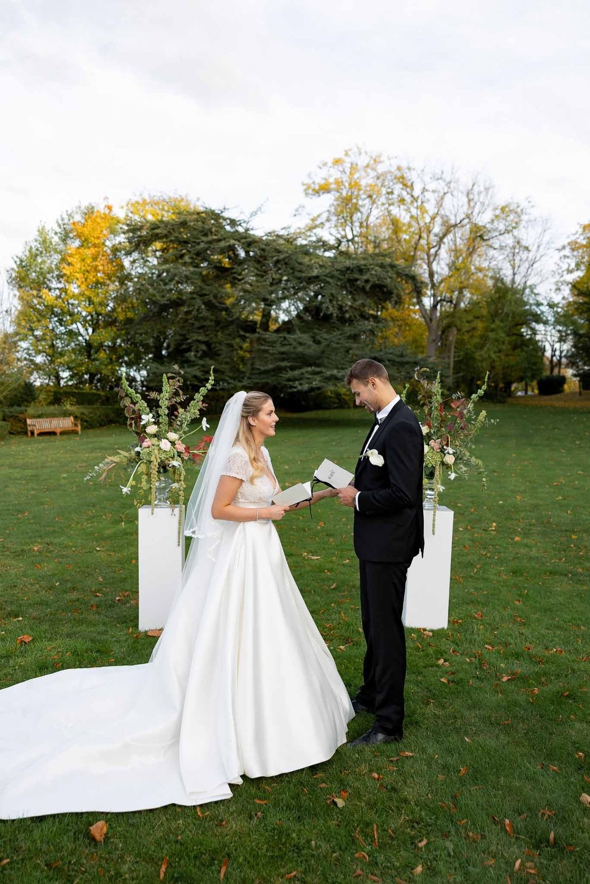 Couple exchanging vows at outdoor garden ceremony at Château Comtesse Lafond
