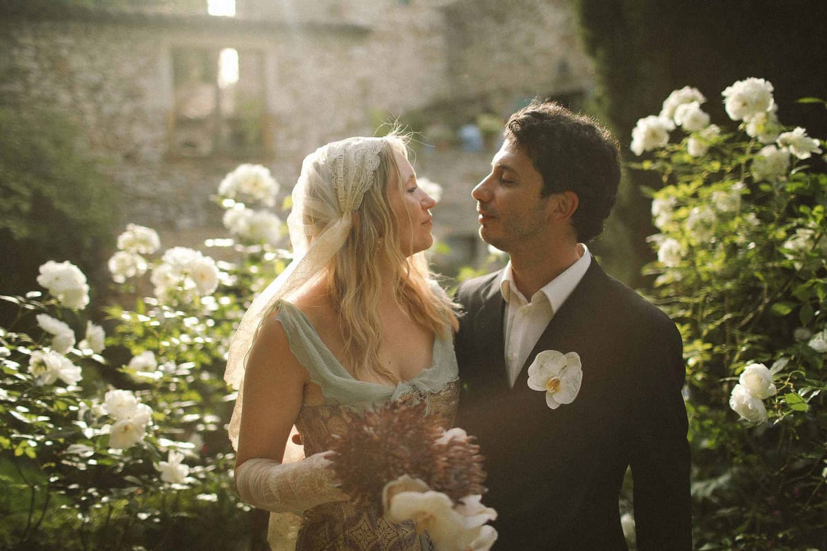 Couple gazing at each other at golden hour at Chateau St Victor Lacoste