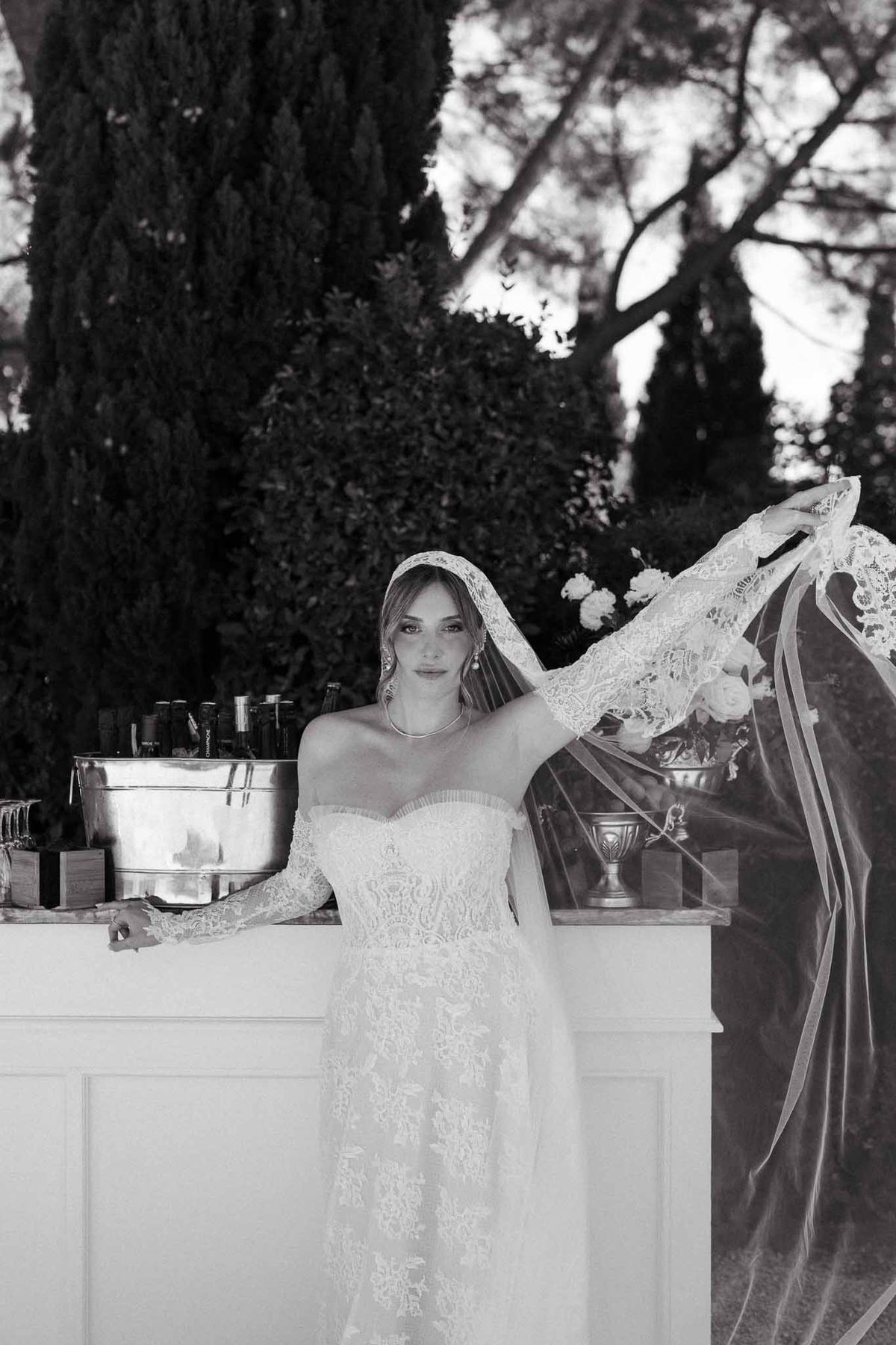 Black and white photo of wedding cocktail hour in a chapel