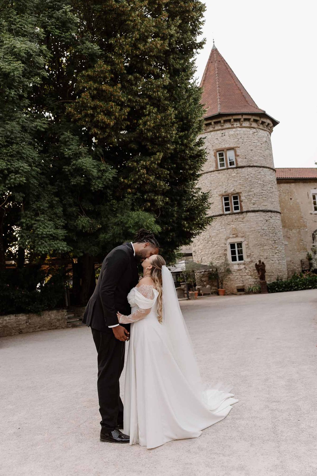 Bride and groom kissing