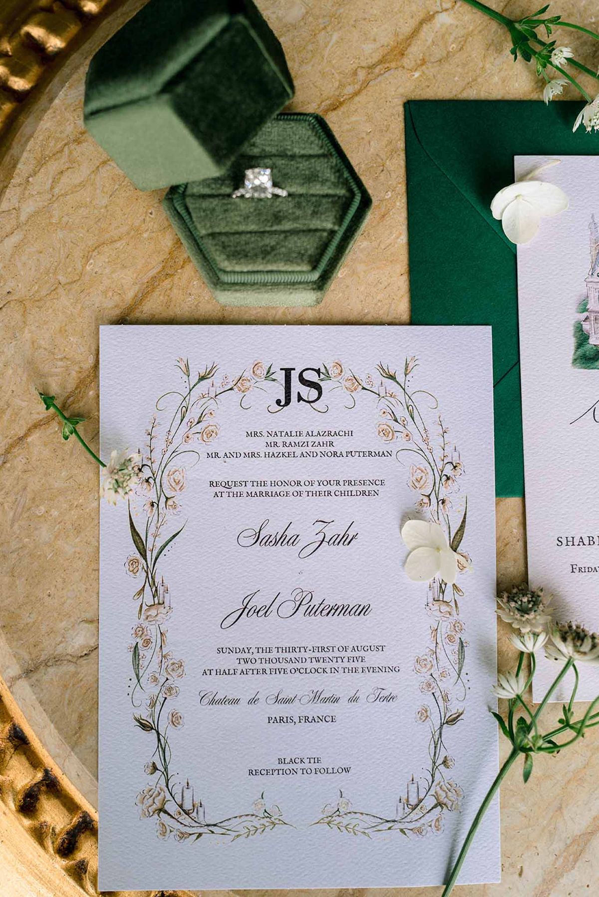 Botanical illustrated invitation suite with emerald velvet ring box and princess-cut diamond on marble gold tray