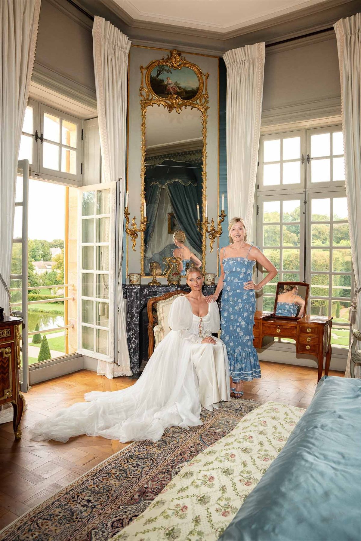 Bride and mother in blue salon at Chateau de Villette