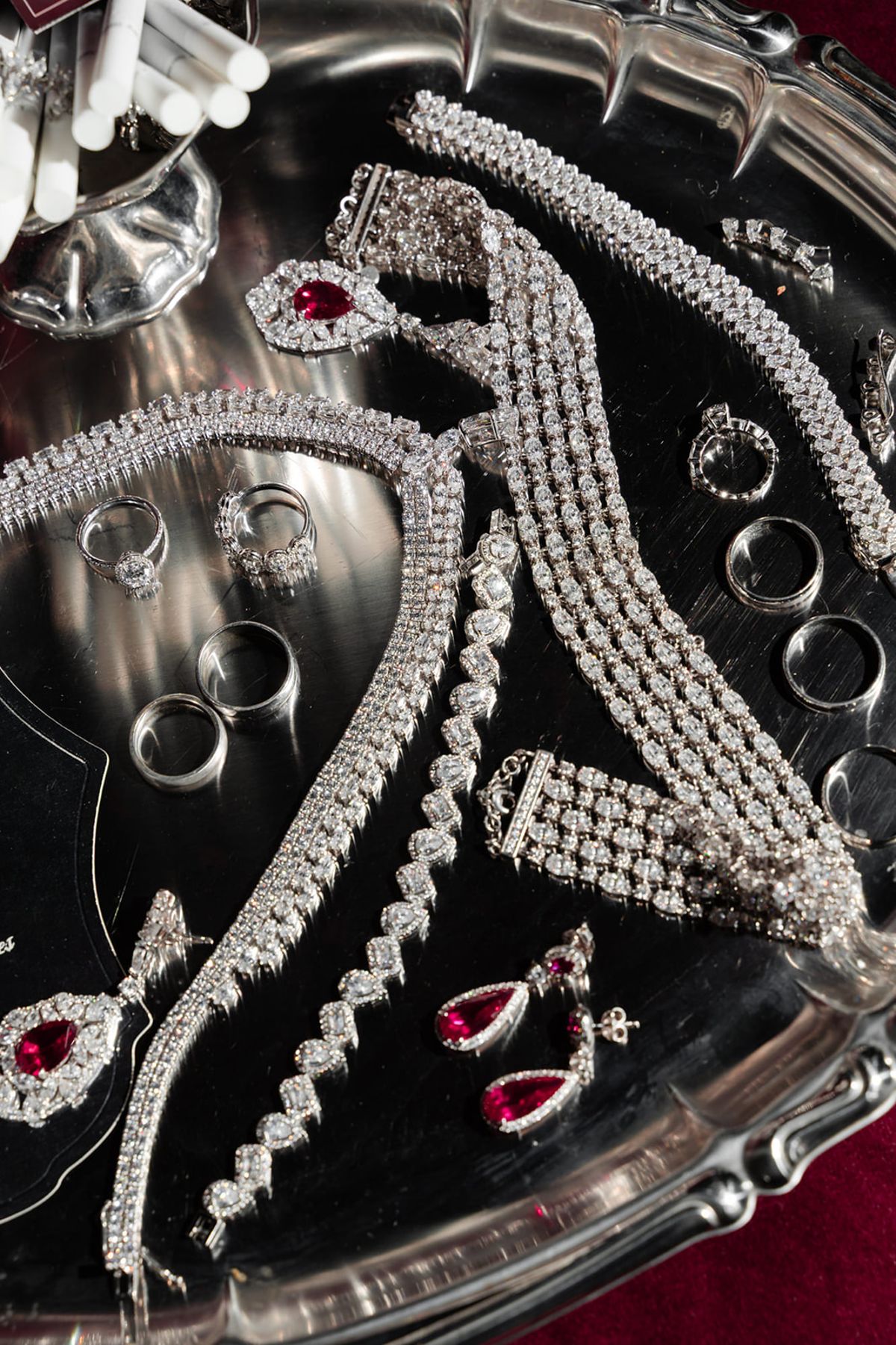 Diamond and ruby bridal jewellery on silver tray at Domaine des Halles wedding
