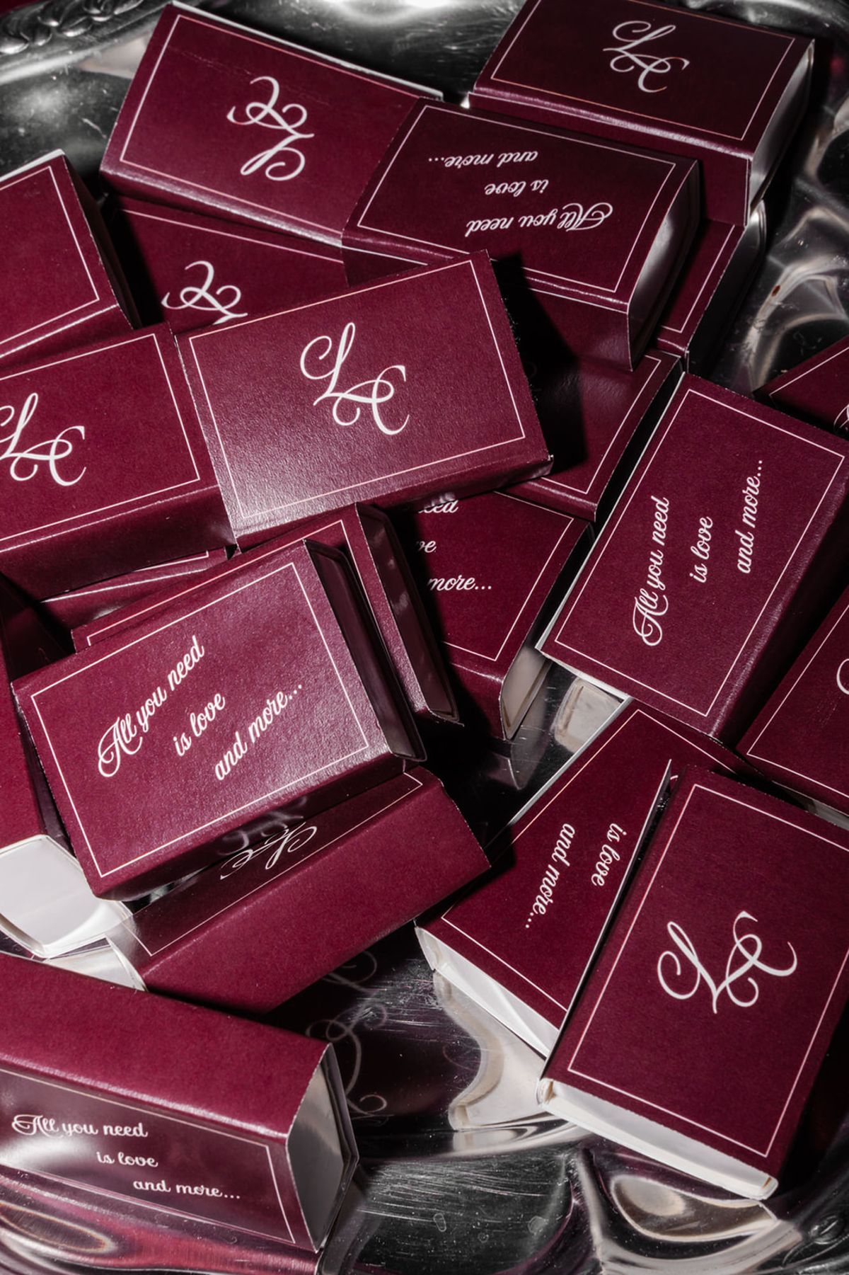Personalised burgundy matchbox wedding favours at Domaine des Halles