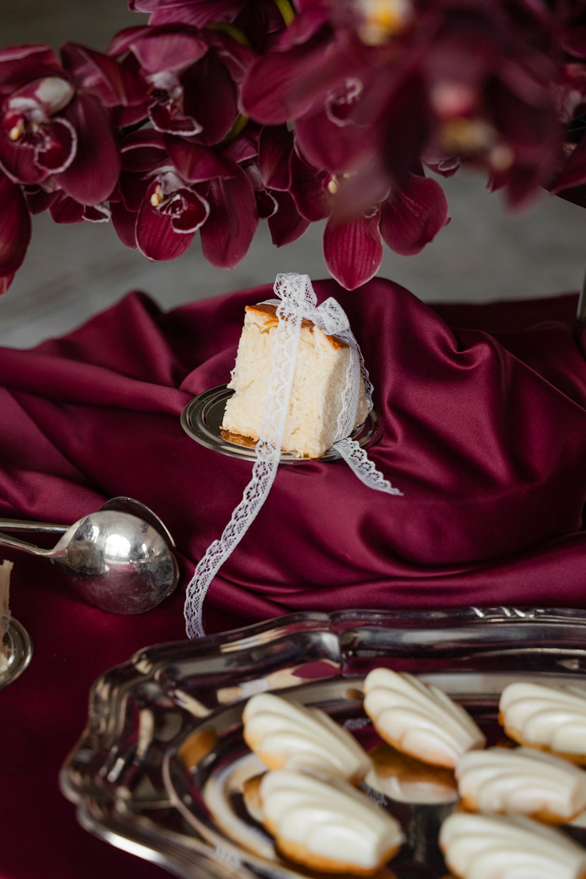 Cake slice and madeleines on silver tray at Domaine des Halles wedding
