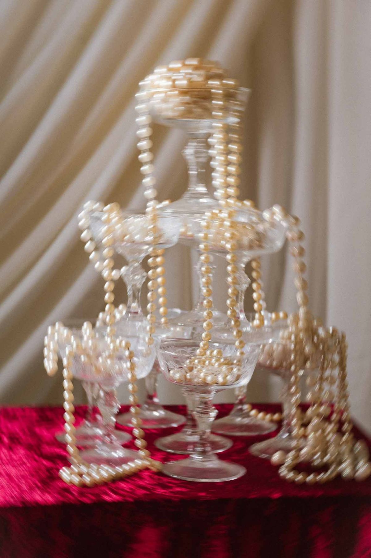 Soft-focus pearl champagne tower at Chateau d'Hazeville