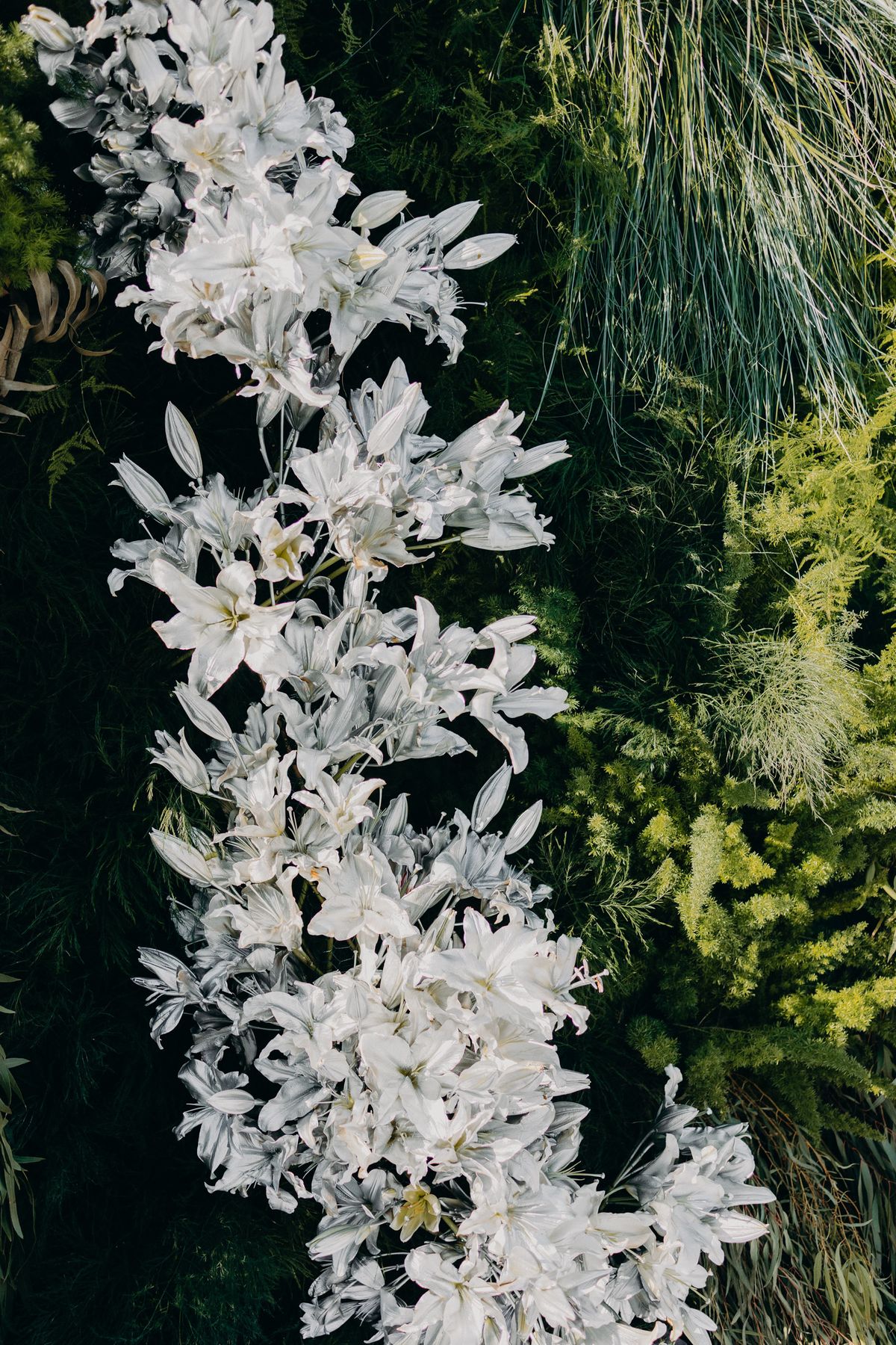 White lilies and grasses in the altar installation