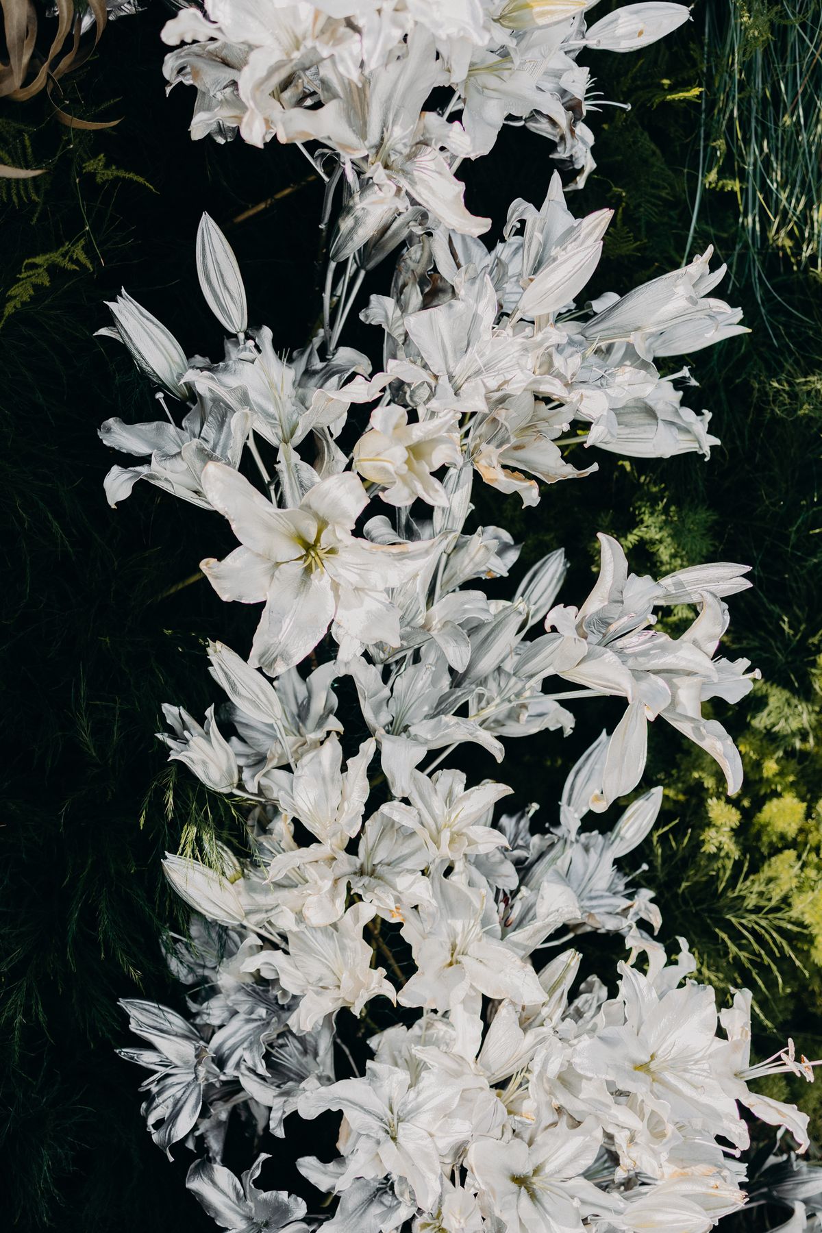 Close detail of lilies in the ceremony florals