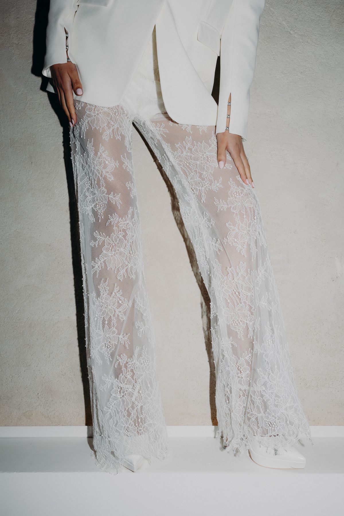 Beaded lace detail of the bridal gown