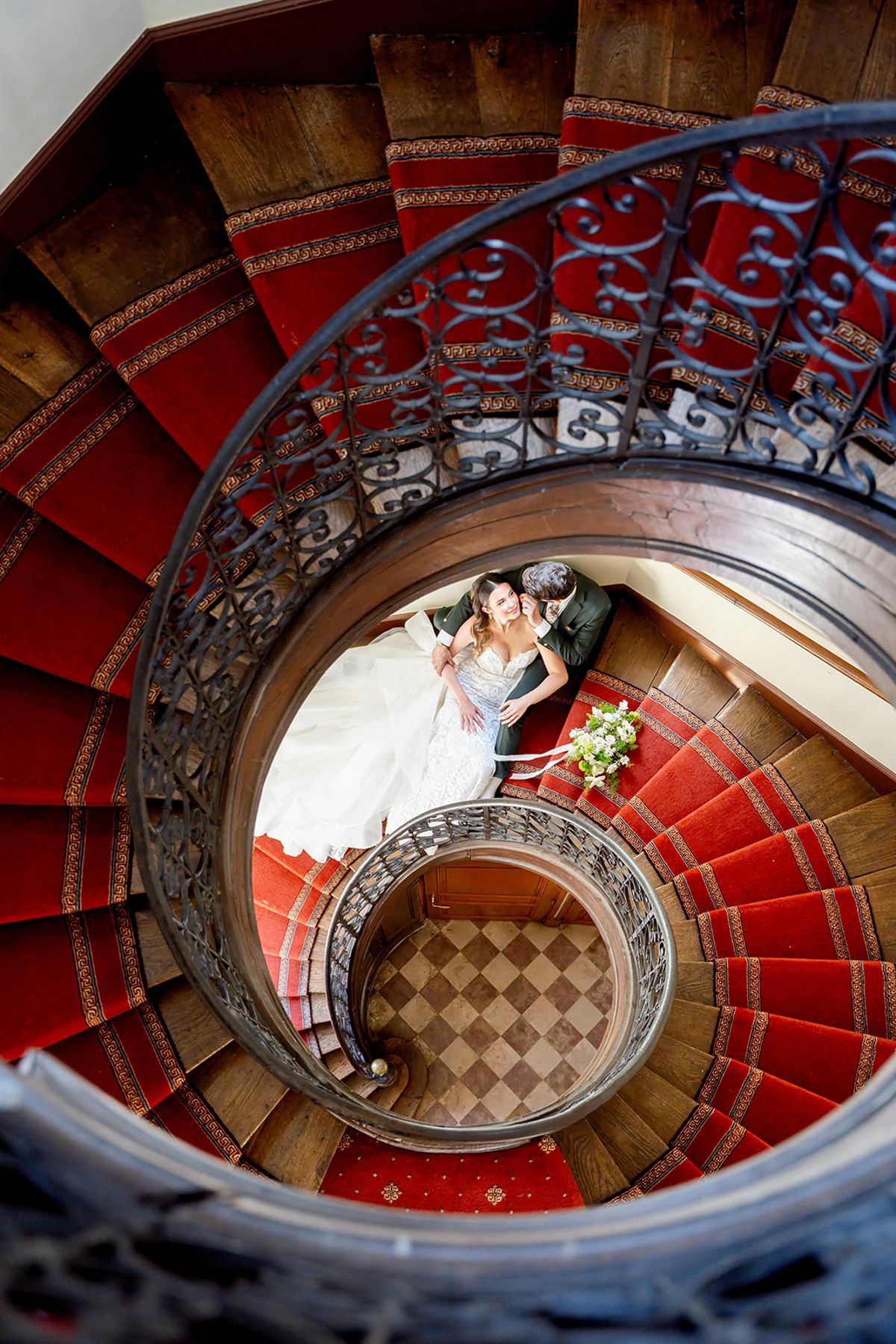 The couple photographed from above on the abbey's spiral staircase